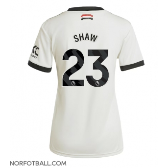 Billige Fotballdrakt Manchester United Luke Shaw #23 Replika Tredjedrakt Dame 2024-25 Kortermet